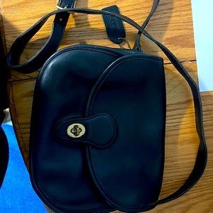 The perfect go to bag simple leather adjustable strap authentic Coach purse